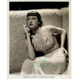 Dorothy Lamour signed 10x8 inch vintage black and white Paramount pictures promo photo. Good