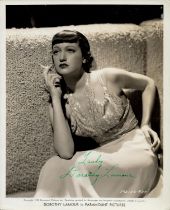 Dorothy Lamour signed 10x8 inch vintage black and white Paramount pictures promo photo. Good