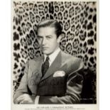 Ray Milland signed 10x8 inch vintage black and white Paramount pictures promo photo. Good Condition.