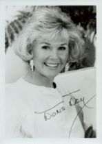 Doris Day signed 7x5 inch black and white photo. Good Condition. All autographs come with a