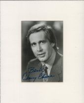 Chevy Chase 10x8inch black and white mount. Good Condition. All autographs come with a Certificate