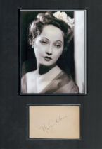 Merle Oberon signed 16x12 inch black and white mount. Good Condition. All autographs come with a
