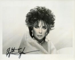 Elizabeth Taylor signed 10x8 inch colour photo. Good Condition. All autographs come with a