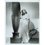 Lauren Bacall signed 10x8 inch black and white photo. Good Condition. All autographs come with a