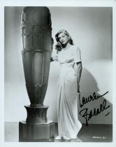 Lauren Bacall signed 10x8 inch black and white photo. Good Condition. All autographs come with a