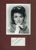 Nancy Kovack signed 16x12inch black and white mount. Good Condition. All autographs come with a