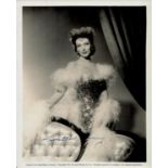 Loretta Young signed 10x8 inch vintage black and white photo. Good Condition. All autographs come