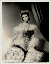 Loretta Young signed 10x8 inch vintage black and white photo. Good Condition. All autographs come