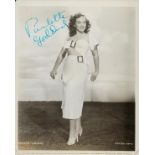 Paulette Goddard signed 10x8 inch black and white vintage photo. Good Condition. All autographs come