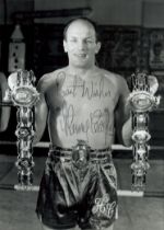 Henry Cooper signed 7x5 inch black and white vintage photo. Good Condition. All autographs come with