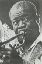 Louis Armstrong signed 7x5inch black and white magazine cutout photo. Good Condition. All autographs