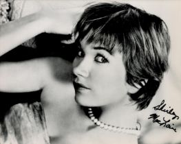 Shirley MacLaine signed 10x8 inch black and white photo. Good Condition. All autographs come with