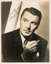 George Brent signed 10x8 inch vintage black and white photo. Good Condition. All autographs come