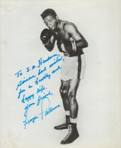 Boxing Floyd Patterson signed 10x8 inch black and white photo. Dedicated. Good Condition. All