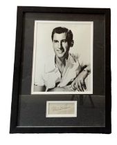 Stewart Granger mounted signature with Black and white photo framed. Measures 17"x13" appx. Good