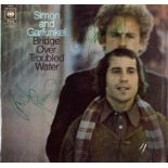 Simon and Garfunkel signed Bridge Over Troubled Water picture record sleeve includes 33 rpm vinyl