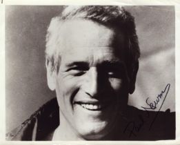 Paul Newman signed 10x8 inch black and white photo. Good Condition. All autographs come with a