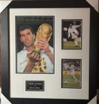 Zinedine Zidane signed photo in frame. Good Condition. All autographs come with a Certificate of