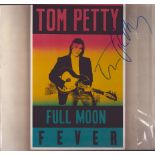 Tom Petty signed Full Moon Fever LP sleeve includes 33 rpm vinyl record. Good Condition. All
