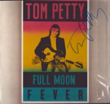 Tom Petty signed Full Moon Fever LP sleeve includes 33 rpm vinyl record. Good Condition. All