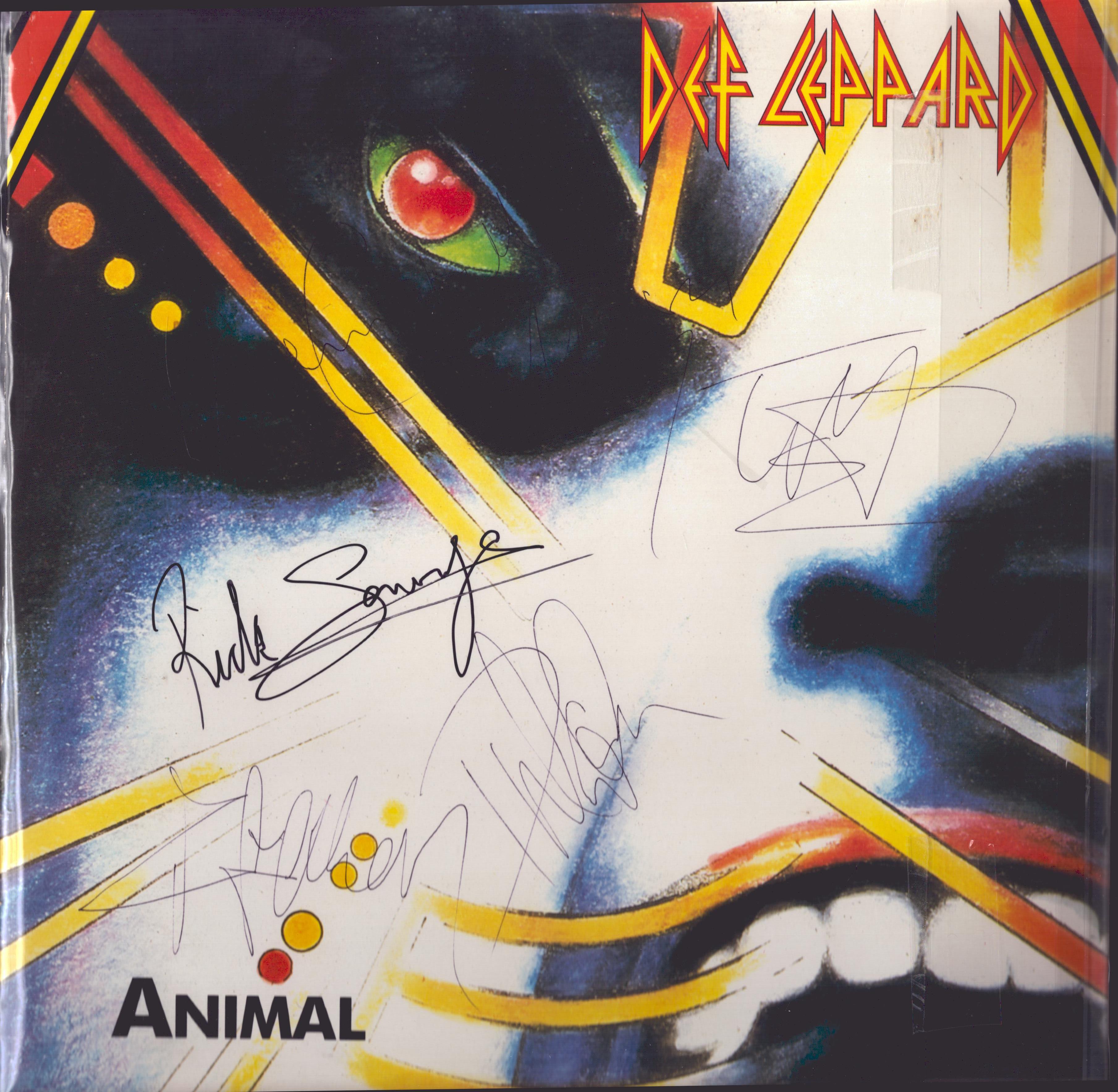 Def Leopard multi signed "Animal" 12in LP Sleeve signatures include Rick Savage, Joe Elliott, Rick