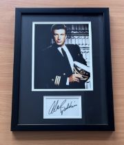 Alec Baldwin signed colour photo in frame with signature below. Measures 17"x13" appx. Good