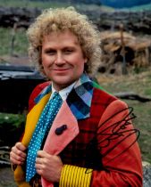 Colin Baker signed 10x8 inch Dr Who colour photo. Good Condition. All autographs come with a