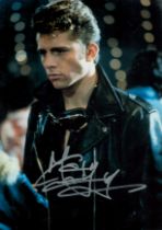 Maxwell Caulfield signed 12x8 inch colour photo. Good Condition. All autographs come with a