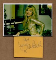 Lynsey de Paul signed small orange cut out signature piece 3.5x2.5 Inch plus unsigned colour photo