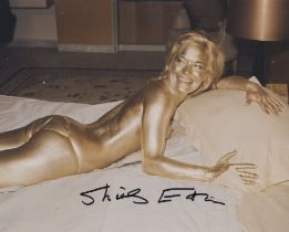 007 James Bond movie Goldfinger 8x10 colour photo signed by Bond girl Shirley Eaton. Good Condition.