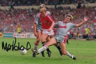 Autographed MARK ROBINS 6 x 4 Photo : Col, depicting Manchester United striker MARK ROBINS evading a