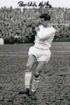 Autographed MEL NURSE 6 x 4 Photo : B/W, depicting a superb image showing Swansea centre-back MEL