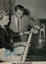 Jerry Lee Lewis signed Vintage Black and White Photo Approx. 9x6.5 Inch. Was an American pianist,