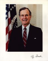George H. W. Bush signed 10x8 inch colour photo. Good Condition. All autographs come with a