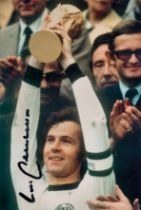 Franz Beckenbauer signed 6x4 inch colour photo. Slight crease down the middle, signature not