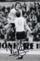 Autographed TERRY BUTCHER 6 x 4 Photo : B/W, depicting Ipswich Town's Russell Osman jumping into the