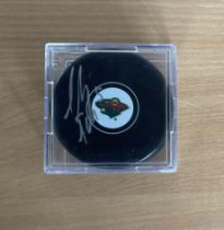 Christian Folin signed official NHL Ice Hockey Puck housed in clear plastic box. Good Condition. All