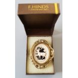 Gold plated Deer Brooch in a F. Hinds Jewellery box. Good Condition. All autographs come with a