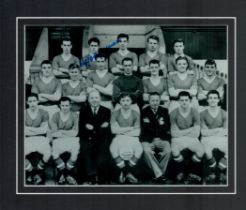 Wilf McGuinness signed mounted Manchester United Team black and white photo, 12x10 inch approx. Good