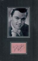 Dickie Valentine signed vintage autograph album page with black and white photo, mounted to an