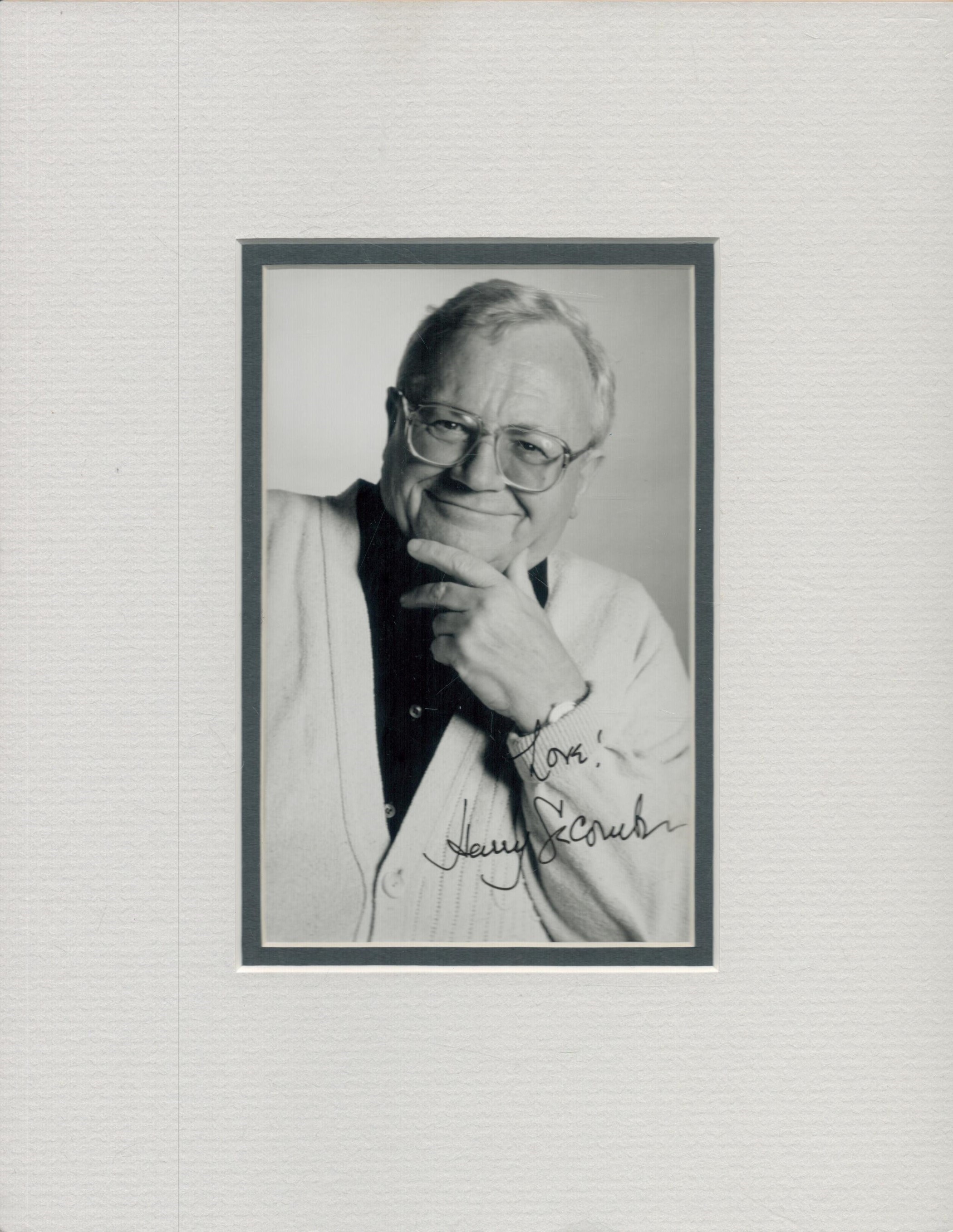 Harry Secombe signed small black and white photo, mounted to an overall size of 10 x 8 inches.