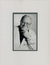Harry Secombe signed small black and white photo, mounted to an overall size of 10 x 8 inches.
