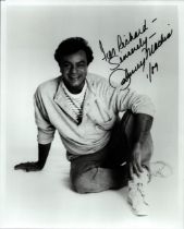 Johnny Mathis Signed 10x8 inch Black and White Photo. Signed in black ink in 1989. Dedicated. Good