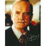 John Cleese signed 10x8 inch James Bond colour photo. Good Condition. All autographs come with a