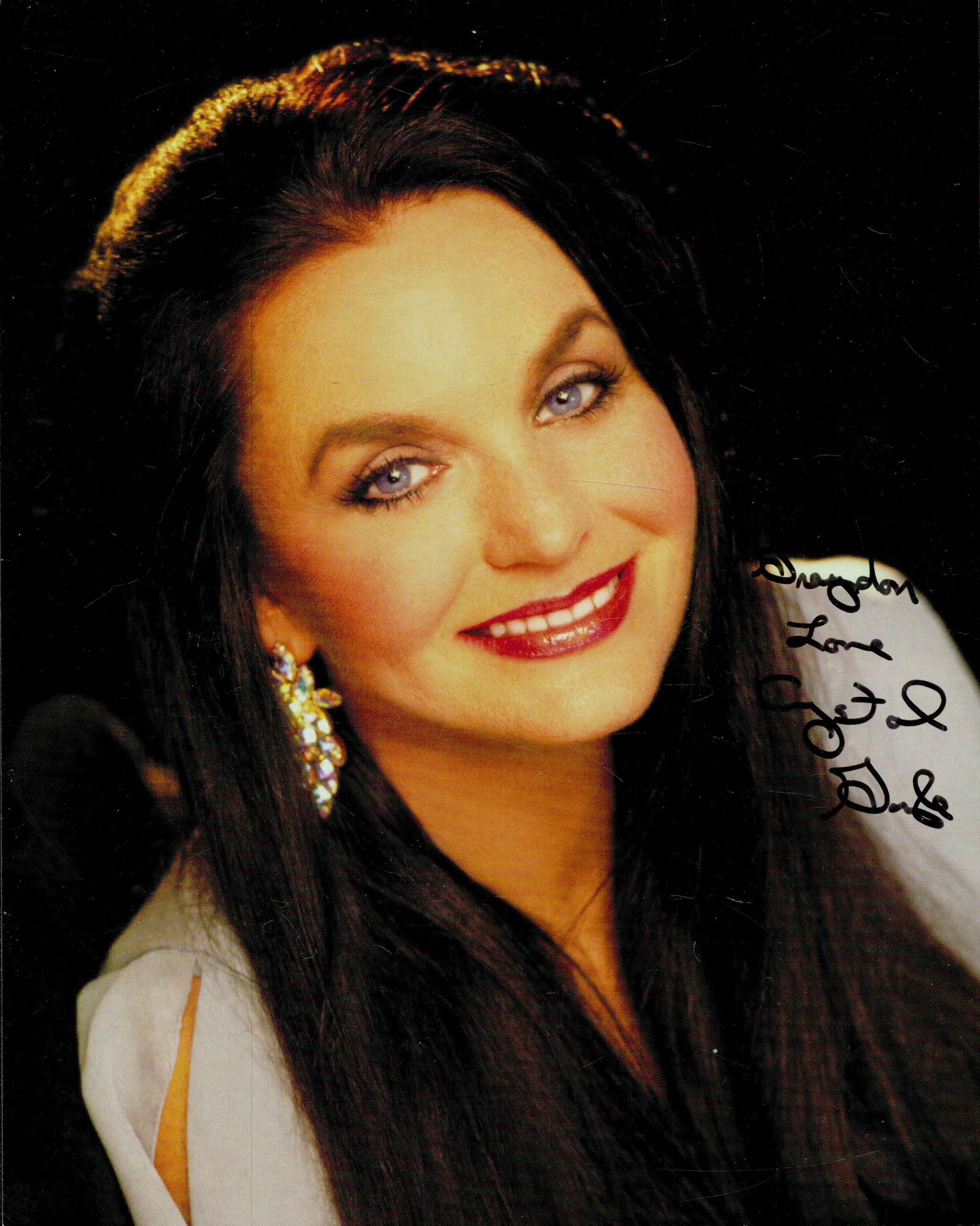 Crystal Gayle signed 10x8 inch colour photo. Good Condition. All autographs come with a