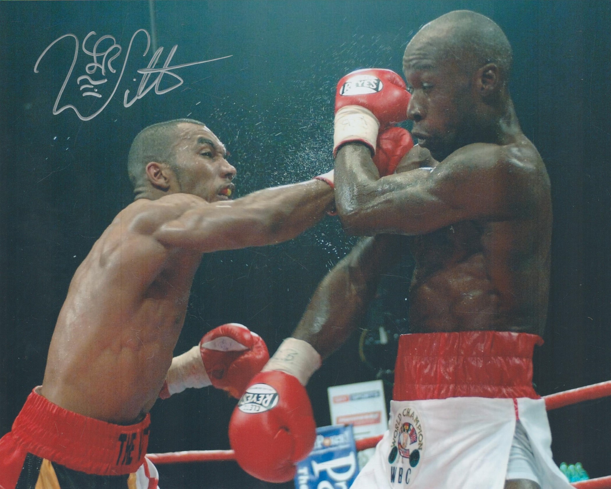 Junior Witter Signed Colour Photo 10x8 Inch. Is a British former world champion professional boxer