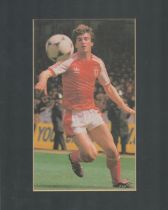 Kevin Ratcliffe 6x8 mounted signed colour photo pictured playing for Wales. Good condition Est.