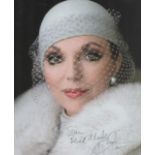 Joan Collins signed 10x8 inch colour photo. Dedicated. Good Condition. All autographs come with a