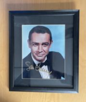 Sean Connery signed 15x13 inch overall framed and mounted James Bond colour photo. Good Condition.