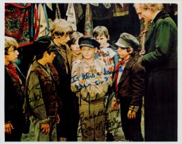 Ron Moody, Mark Lester and Jack Wild signed 10x8 inch colour Oliver! Photo. Good Condition. All